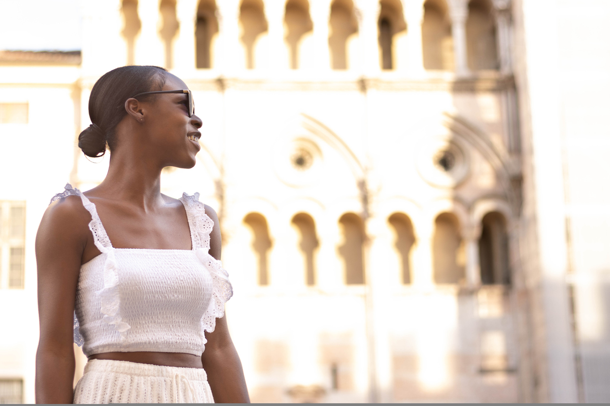 Young black woman abroad in Europe, Ferrara. Italy.